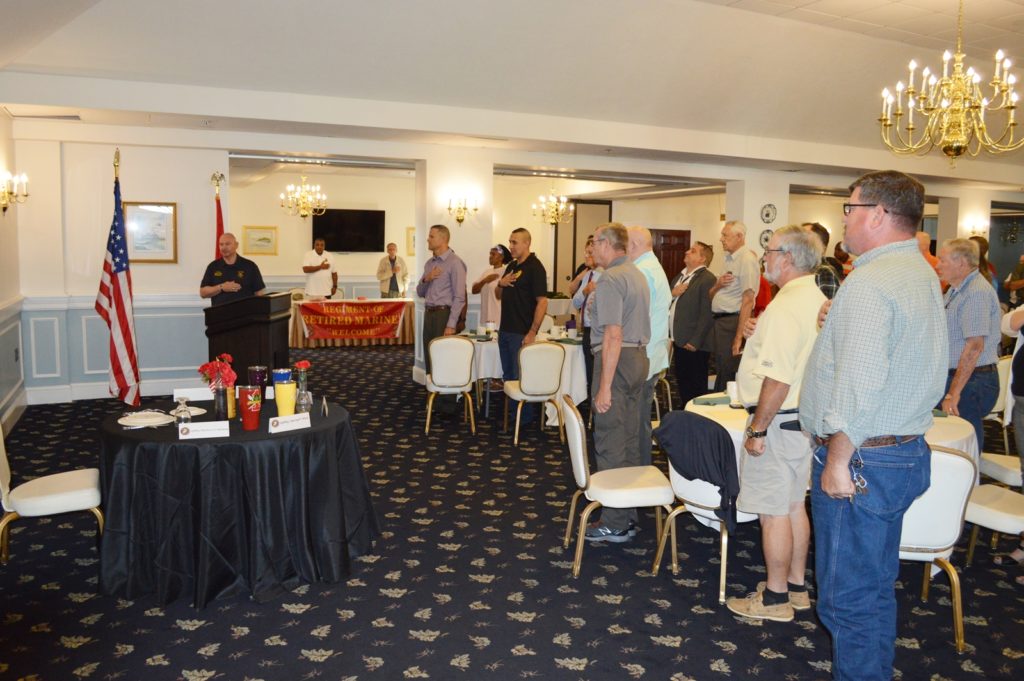 The Pledge of Allegiance was lead by Joe Houle, MSgt, USMC (RET), prior to the start of the Regiment of Retired Marines Retiree Breakfast May 7, 2022. The event was held at the Paradise Point Officer’s Club aboard Camp Lejeune, NC. Guests enjoyed visiting with Retirees from all branches of service and received information that affects all active duty and retired service members.